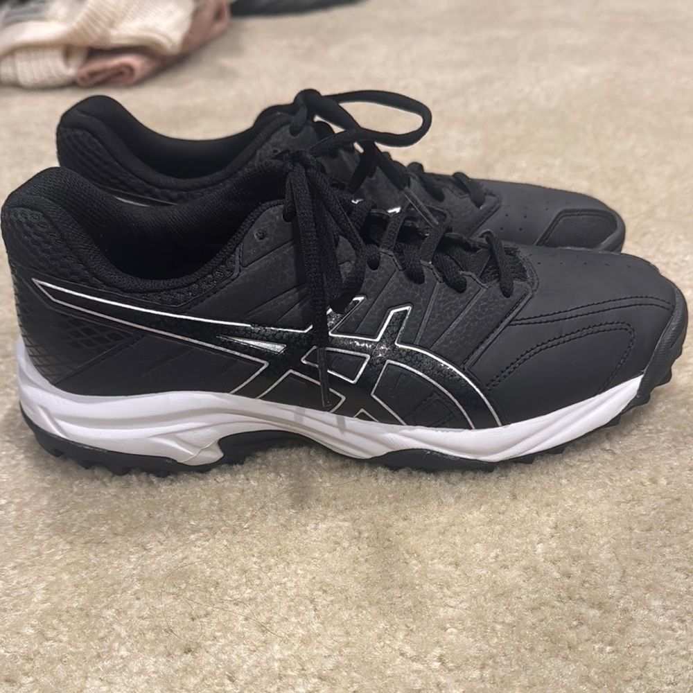 Black and White Asics Turf shoes size 8